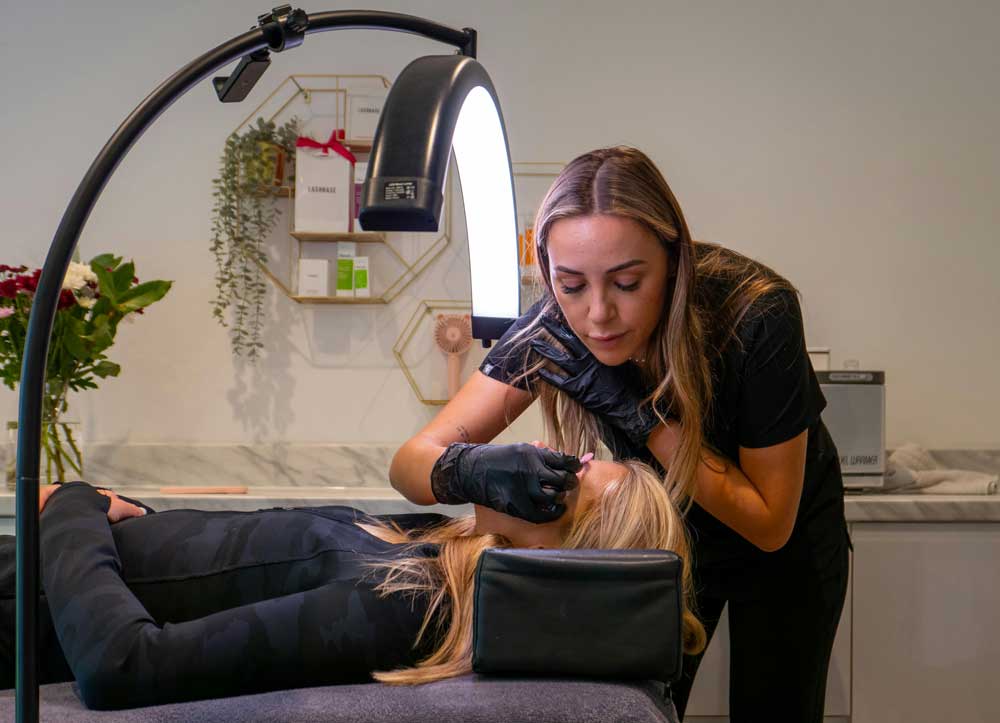 Beauty technician performing a treatment